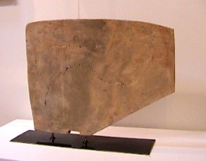 Abstract angular ceramic clay sculpture on steel base