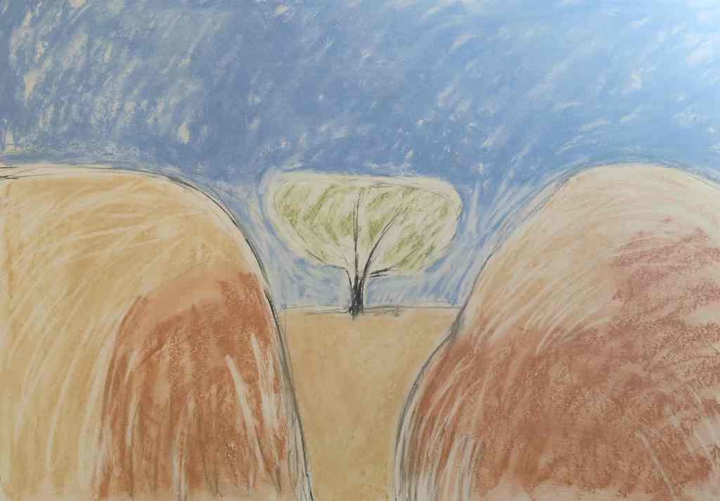 Paiting of two large, sandy coloured boulders, with a tree between them, in the distance, with blue sky behind. Made with soft pastels and charcoal by artist Sera James Irvine.